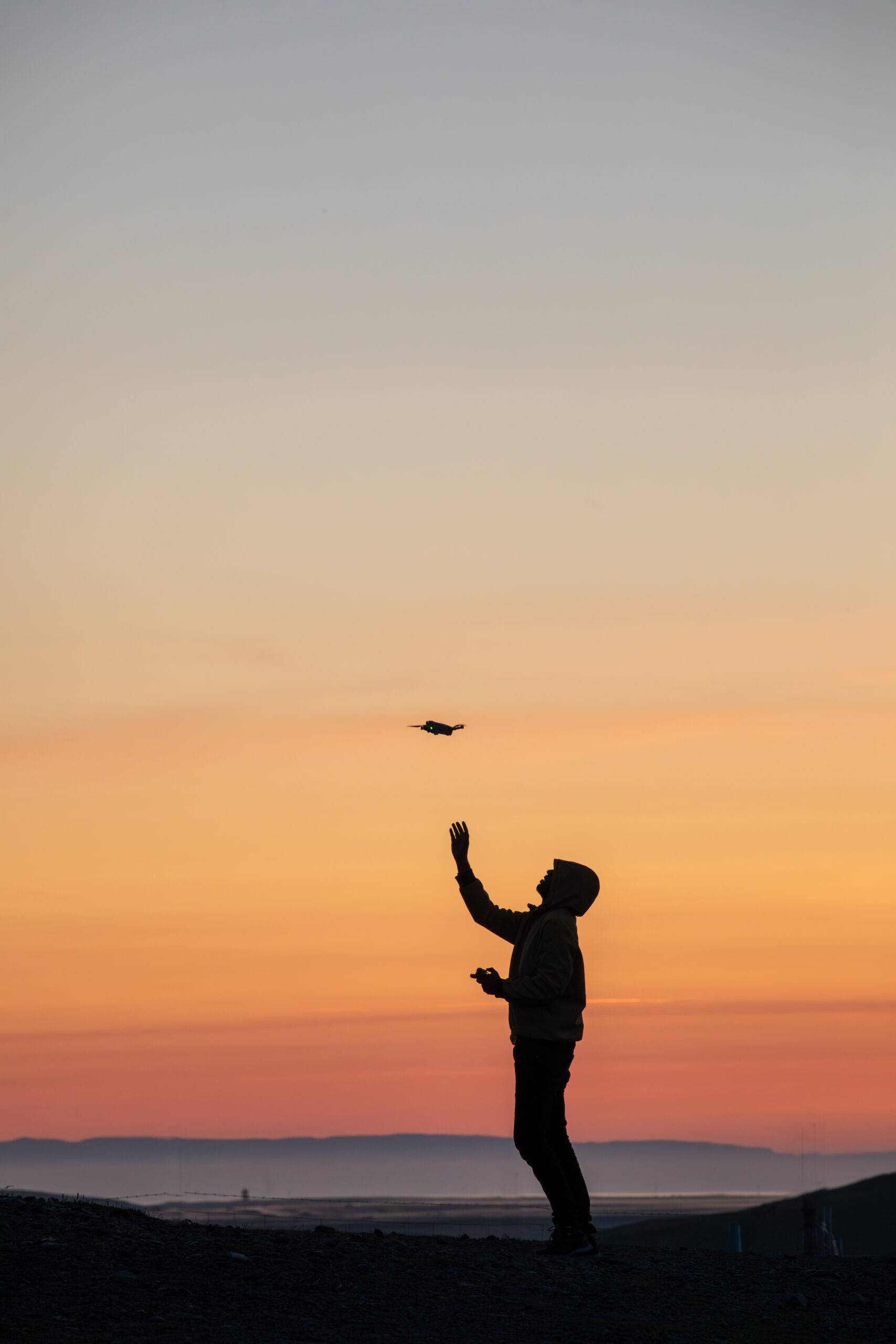 Sunset image in background, image of drone deployment